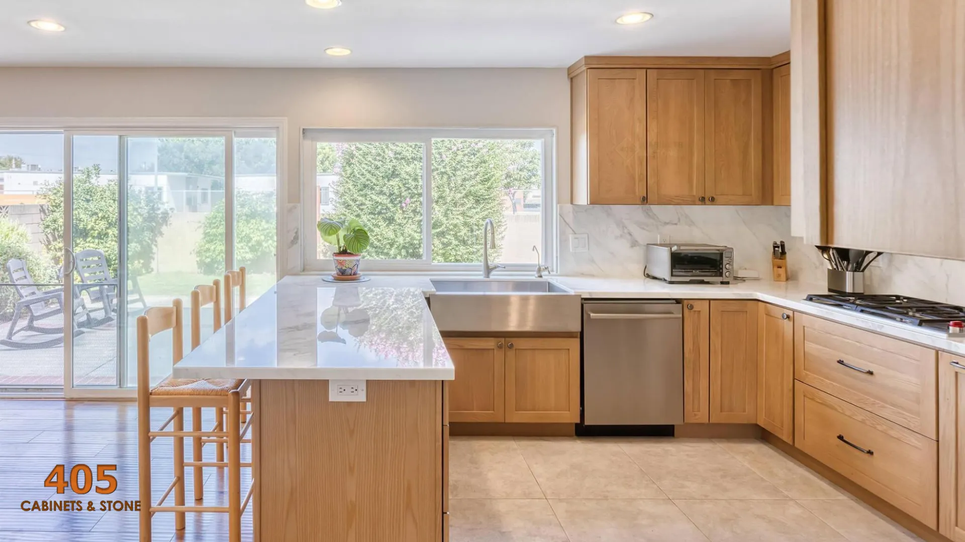 oak kitchen cabinets with white countertops 2