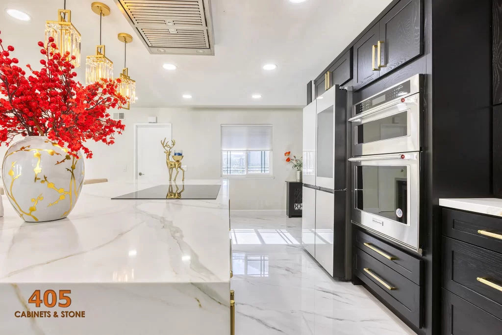 The kitchen features elegant Shaker style black cabinets with rich wood veins, beautifully contrasting with a white nano-crystallized countertop.